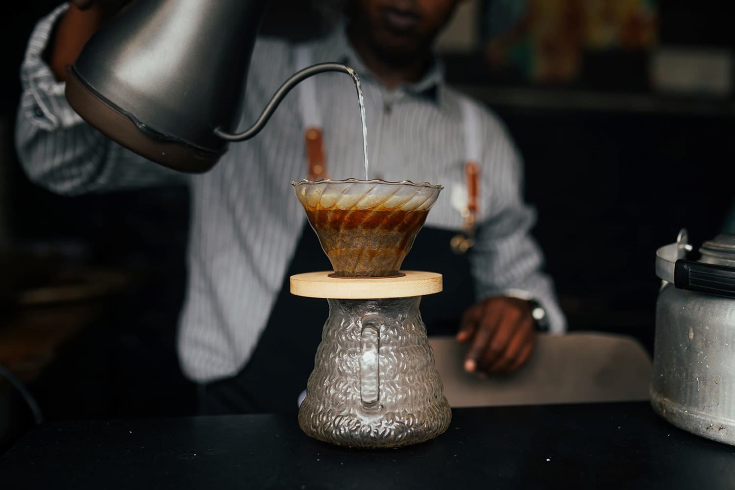 Barista pouring coffee at One Cup Coffee (1)