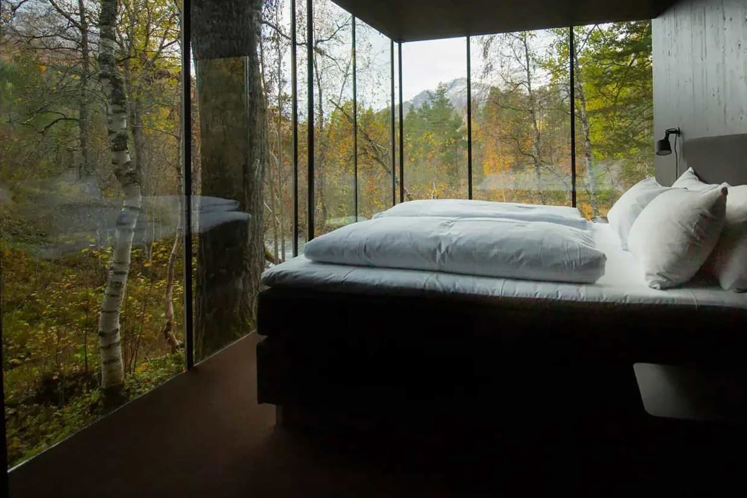 Stay inside glass-walled rooms at the Juvet Landscape Hotel