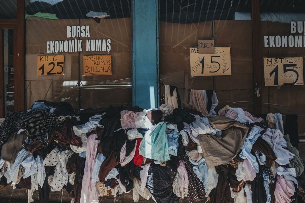 Too many clothes creates too much waste. Courtesy of Pexels.